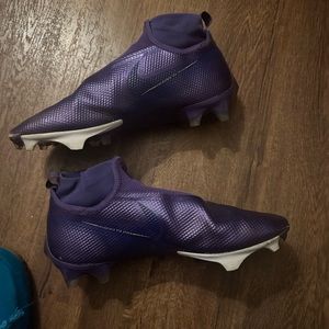 Purple Nike cleats